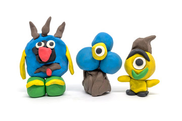 Play dough group monsters on white background. Handmade clay plasticine