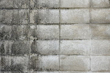 Pattern of grey wall made of concrete bricks