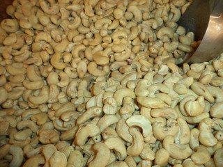 fresh peeled cashew nuts on the counter in the store
