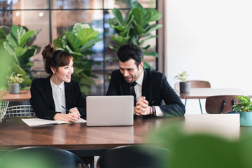 Young asian business group discussion in office workplace. lifestyle social distance friends meeting corporate office.
