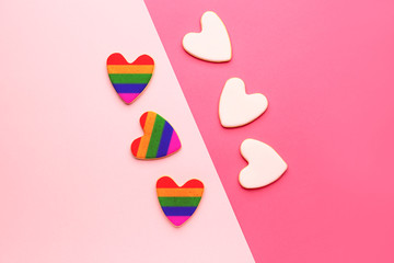 Heart shaped cookies on color background. LGBT concept
