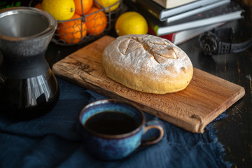 Fototapeta na wymiar homemade artisanal wholewheat bread on table