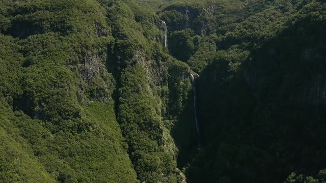 AERIAL: Waterfalls in the mountains in Madeira