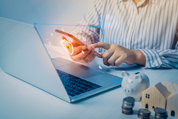 Person using a laptop computer with technology cybersecurity and privacy concept. protection and safe data for global network security.