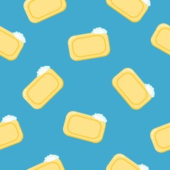 Seamless pattern pieces of solid yellow soap. Color illustration on a blue background.