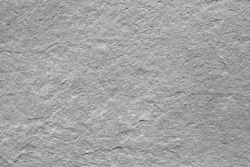 Gray embossed texture of natural stone, marble.
