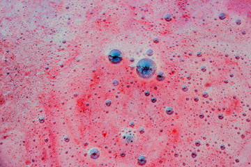 Strawberry jam texture.. Making jam at home. Cooking in kitchen.