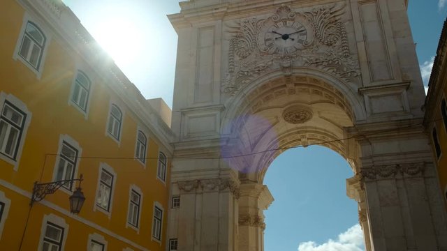 Epic contre-jour shot of the Rua Augusta Arch in Lisbon, Portugal. The stone, triumphal arch-like building dates back to 1873