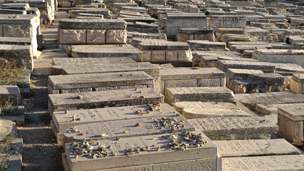 Jewish cemetery in the old city of Jerusalem. The Jews do not leave flowers in the graves, they leave stones.