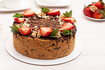 cake anthill with strawberries and nuts