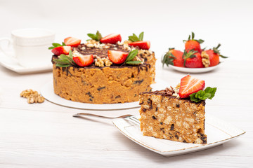 cake anthill with strawberries and nuts