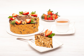 cake anthill with strawberries and nuts
