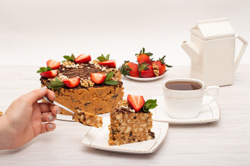 cake anthill with strawberries and nuts