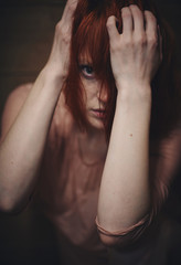 Beautiful redhead girl in the shower