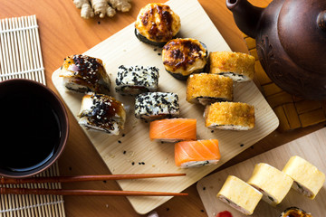 Rolls on a wooden Board. Japanese food on the table