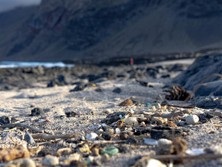 Plastics in the sand on the beach.  The pollution of our seas reaches the island of El Hierro.