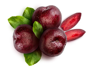 Appetizing and healthy red plums, whole and cut into segments with an aspect of illustration. Includes leaves of the plum tree. Isolated on white background.