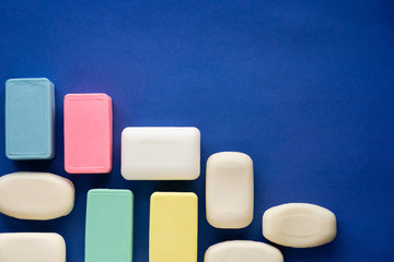 Various soap bar on a blue background