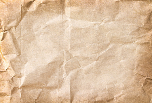 Wrinkle paper texture abstract brown background , copy space