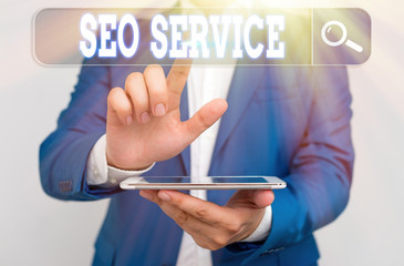 Conceptual hand writing showing Seo Service. Concept meaning techniques and procedures to increase...