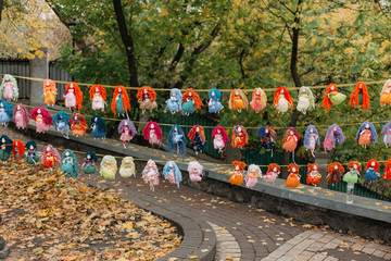 funny colored dolls in the park.
