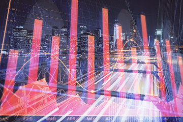 Forex chart on cityscape with tall buildings background multi exposure. Financial research concept.