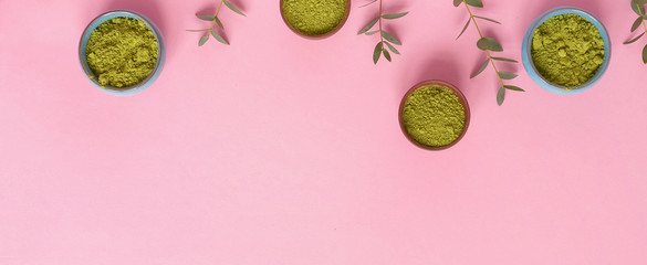 matcha tea in little jar on pink background. Concept healthy drink, copyspace, flatlay, top view,...