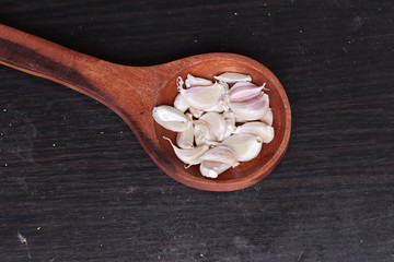 One whole aromatic white garlic isolated on white background