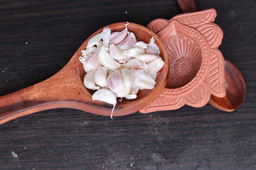 One whole aromatic white garlic isolated on white background