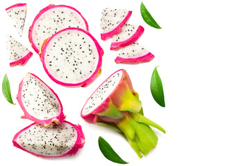Sliced Ripe Dragon fruit with green leaves isolated on white background. Pitaya or Pitahaya Top view