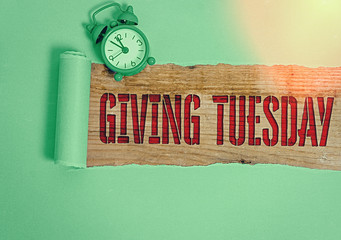 Handwriting text writing Giving Tuesday. Conceptual photo international day of charitable giving...
