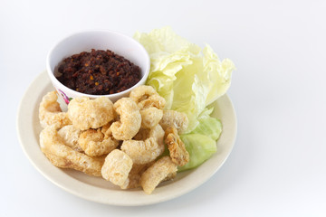 Roasted Pork CRoasted Pork Chili Paste serve with fried pork rind and fresh vegetableshili Paste