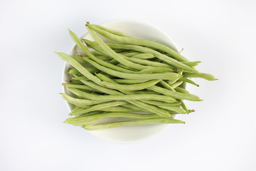 Top View Of Green Beans In Plate On Table