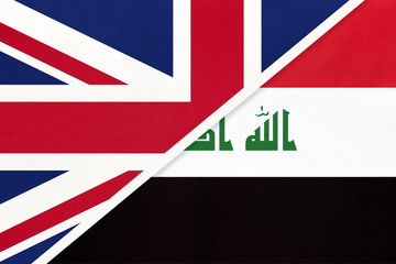 United Kingdom vs Iraq national flag from textile. Relationship between two european and asian countries.