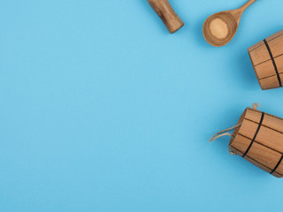 Wooden household items on a blue background.