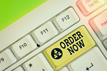 Conceptual hand writing showing Order Now. Concept meaning the activity of asking for goods or...