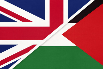 United Kingdom vs Palestine national flag from textile. Relationship between two european and asian countries.