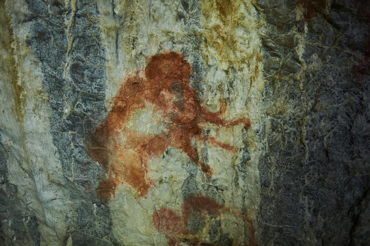 Rock paintings in a stone cave of an ancient prehistoric Neanderthal man. Mammoth. stone Age. Ice Age. Shulgan Tash Cave Russia Bashkiria