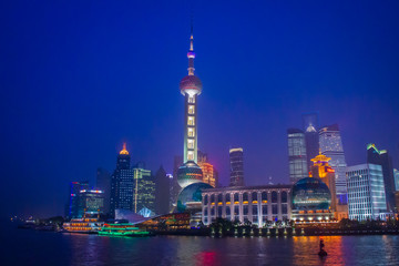 Shanghai, China - July 4, 2011 : Business center of Shanghai as seen from the river at night
