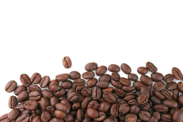 Dark coffee beans placed on a white scene.