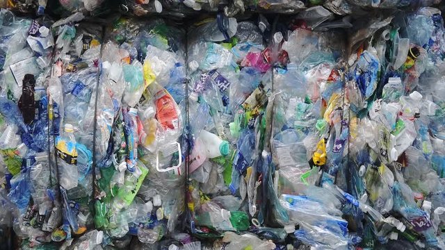 Rows Of Plastic Container Full Of Rubbish And Throw Aways In Hong Kong. -close up shot