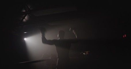 Silhouette of boxer celebrating after winning fight