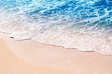 Fototapeta na wymiar Soft blue ocean wave,sandy beach,backround