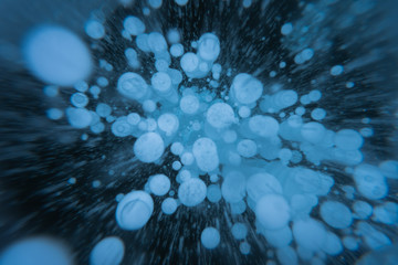Methane Bubbles in frozen lake Baikal in winter season, Siberia, Russia