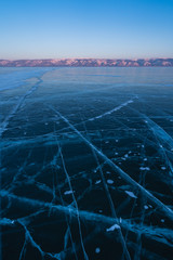 Ice crack in frozen Baikal lake in winter season, Siberia, Russia