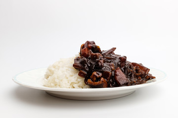 Jjajang rice in a dish on a white background