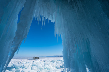 Ice cave in Baikal frozen lake in winter season, Siberia, Russia