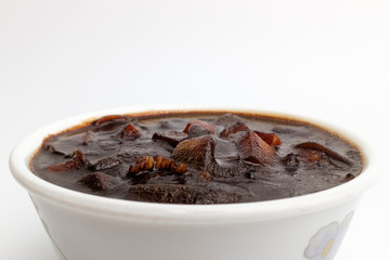 Jjajang sauce with vegetables and jjajang on white background