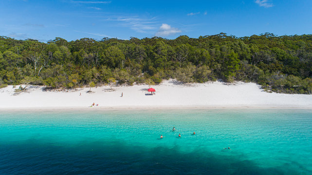 Fraser Island, Queensland / Australia: March 2020: Tourists flock to Lake Mackenzie year round to enjoy the cool freshwater lake