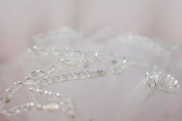 Sofia, Bulgaria - March 24, 2020. White pink lace pattern. Blurry wedding texture. White veil.